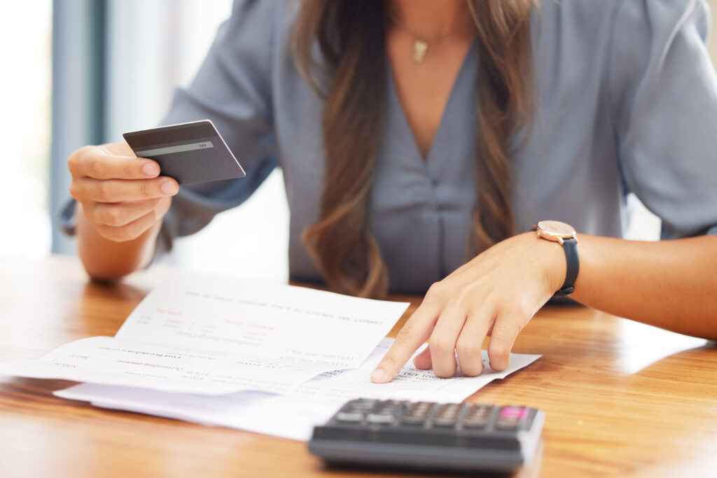 business owner holding a credit card